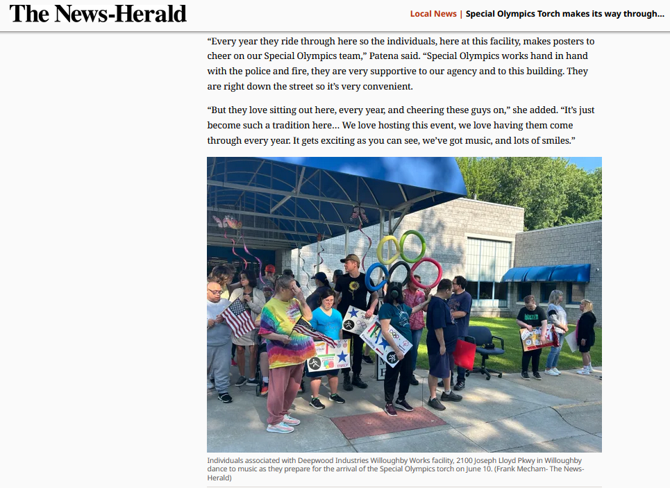 A snippet of an article by The News-Herald. It features an image of people with Olympics memorabilia and signs, and the text reads: “Every year they ride through here so the individuals, here at this facility, makes posters to cheer on our Special Olympics team,” Patena said. “Special Olympics works hand in hand with the police and fire, they are very supportive to our agency and to this building. They are right down the street so it’s very convenient.“But they love sitting out here, every year, and cheering these guys on,” she added. “It’s just become such a tradition here… We love hosting this event, we love having them come through every year. It gets exciting as you can see, we’ve got music, and lots of smiles.”